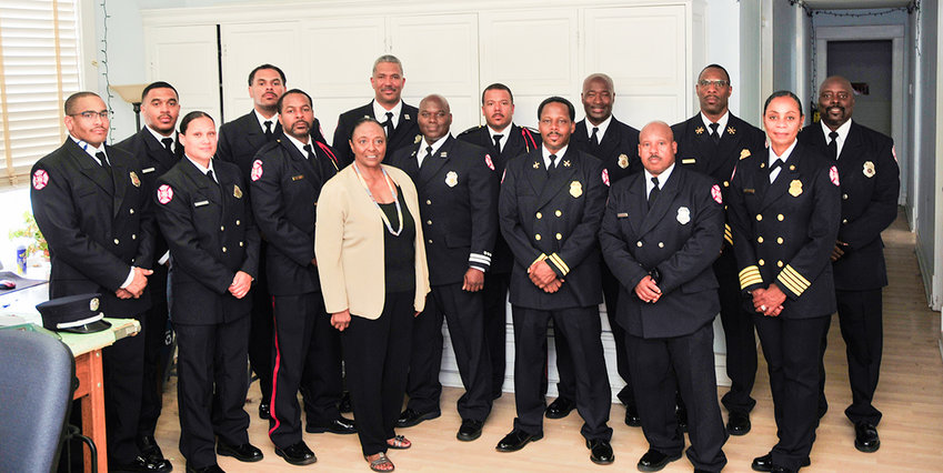 Retired Judge LaJune Lange with members of the African American Firefighters Association at Fire Station #24. (Photo by Walter Griffin)