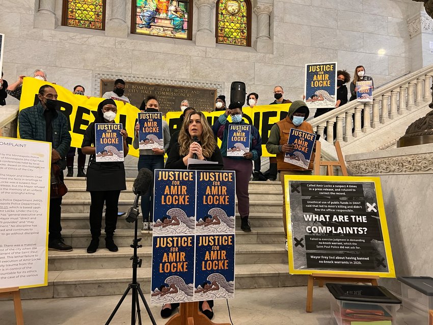 Dozens gather at Minneapolis City Hall on Feb. 11 to hand deliver ethics complaints by 1,250 Minneapolis residents against Mayor Jacob Frey related to the killing by police of Amir Locke. &ldquo;The Residents&rsquo; Complaint&rdquo; asserts that the mayor and interim police chief &ldquo;intentionally and recklessly misrepresented the facts&rdquo; when they repeatedly referred to Amir Locke as a suspect; the mayor violated his duty by not firing or disciplining the officer who fatally shot Locke; and it was a &ldquo;massive failure to exercise judgment&rdquo; for MPD to use a no-knock search warrant on behalf of the St. Paul Police Department when St. Paul hadn&rsquo;t asked for one. Kristin Ingall, a southwest Minneapolis resident and mom, told the crowd in the rotunda that for too long it has been the inactions of &ldquo;ordinary people, like me,&rdquo; that has kept a harmful system running. &ldquo;Amir Locke was executed by the Minneapolis Police Department and the negligence and inaction of Mayor Frey. And yet there has been no accountability. Why do we accept that as residents of Minneapolis?&rdquo; she asked. Complaint forms are being sent to the city of Minneapolis Ethical Practices Board. Those filing complaints must be residents of Minneapolis and at least 18 years of age. More information is available on Instagram @TheResidentsComplaint. (Photo by Jill Boogren)
