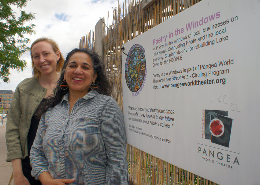 Meena Natarajan (left) and Ingrid Rasmussen stand at the future site for the Pangea Theater on the 27th Ave. block between Lake and 31st Street. (Photo by Terry Faust)