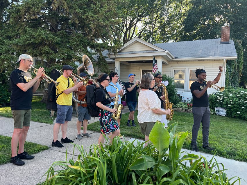 Brass Solidarity plays a few tunes in front of the Arthur and Edith Lee house at 4600 Columbus where an angry mob gathered in 1931 to force the family out. (Photos by Jill Boogren)