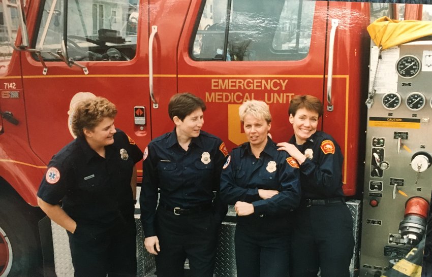 Fire Motor Operator Mary Mohn, Firefighter Bonnie Bleskachek, Firefighter Vicki Hoff and Captain Jean Kidd, who from 1992-1994 formed the city&rsquo;s first all-women crew, in front of their rig, Engine 5.