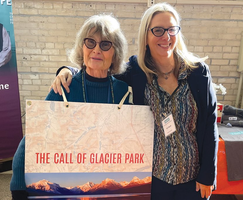 Writer, professor and Rain Taxi board member Kris Bigalk, right, with author Margaret Hasse promoting her new book &ldquo;The Call of Glacier Park&rdquo; at the 2022 Twin Cities Book Festival in St. Paul.