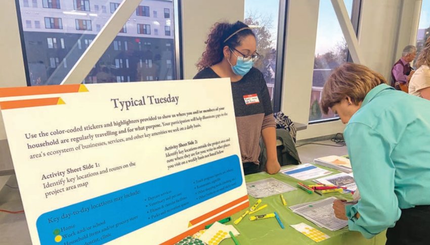 Peg Thomas fills out where she travels throughout Minneapolis on a typical Tuesday. Residents filled out these forms at the open house to discuss the former Kmart site on Oct. 25 in order to help city planners see what would be helpful to add in the area.
