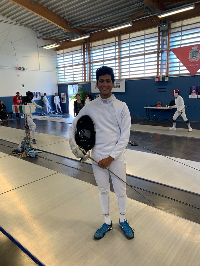 I had the opportunity to join a fencing club in Rennes and I participated in two tournaments in the semester. My fencing coach took a photo of me before my first tournament, which was a national tournament in Dax. I placed 25th out of 204 fencers in the two-day competition, and I had a wonderful experience receiving advice and support from my French teammates.