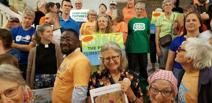 Citizen rally prior to a public hearing on the new Climate Equity Plan at city hall on June 8, 2023.