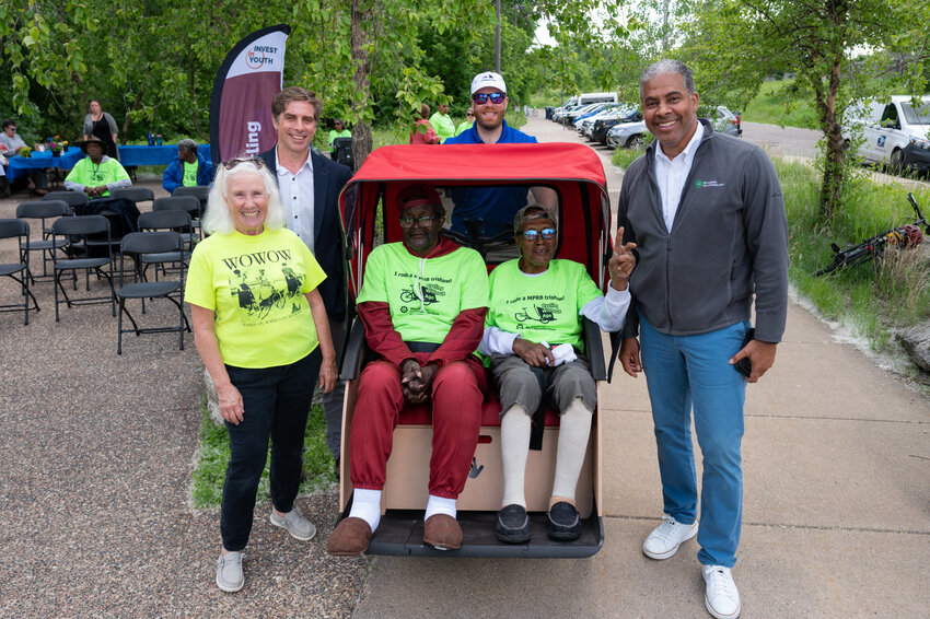 Minneapolis Parks and Recreation Board President Meg Forney (eft), City of Minneapolis Director of Public Works Tim Sexton, and MPRB Superintendent Al Bangoura (right) pose with residents of the nearby Victory Health + Rehabilitation Center.  (Photo by submitted)