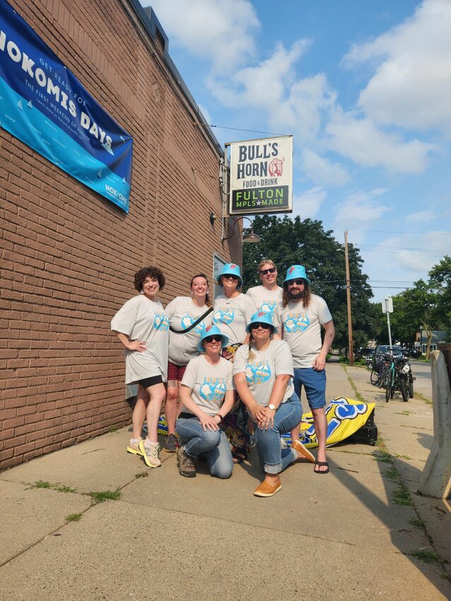 Nokomis Days planning committee members include (back row, left to right) Kara Motta and Rachel Garrison of The Wellness Center MN, Tesha M. Christensen of the Longfellow Nokomis Messenger, Kyle of Nokomis Life, Peter Stein of Steinography, (front row) Heidi Van Heel of hvh Engage! and Jackie Sawyer of Nokomis Tattoo.