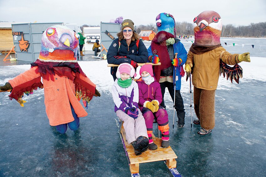 Eileen Anderson (former Southwest resident), along with daughter Claire Anderson and friend Savanna Lockovitch, are welcomed to “Where Do Pigeons Go in the Winter?” by pigeon performers (left to right) Josh Conroy, Patty Gille, and Kayla Nussbaum. The puppet performance aimed to challenge the notion that pigeons are pests by showing their importance throughout history and what truly amazing birds they are.