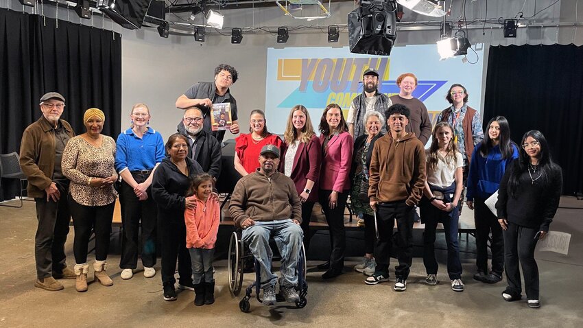 Strong Mind Strong Body Foundation’s Youth Community Journalism Institute team with friends, family, and collaborators at St. Paul Neighborhood Network (SPNN) on March 10 after producing “Youth Community Journalism — Episode 9: Rebuilding Community in America.” (Photo by Eric Ortiz)