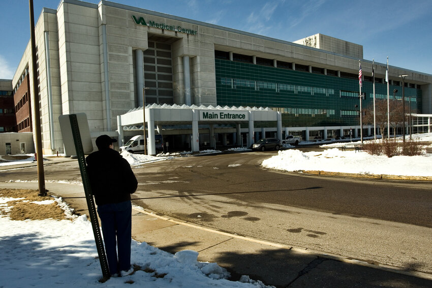 Pictured at left outside the Minneapolis VA Hospital, Rose said, “I know I can get another job, and that a lot of people have it worse than I do. But I am finding it hard to wrap my head around what’s happening right now.” (Photo by Margie O’Loughlin)