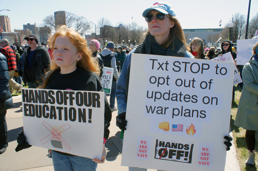 Como residents Ingrid Johansen and her daughter, Klara Anderson joined over 25,000 people at the Minnesota Capitol on Saturday, April 5, part of the nationwide “Hands Off!” protests. It was the biggest day of demonstrations against President Trump since his second term began. In Minnesota, protests were also held in Rochester, Duluth, and Bemidji. The demonstrations were organized by 50501: Minnesota, Indivisible and Women’s March Minnesota. (Photo by Terry Faust)