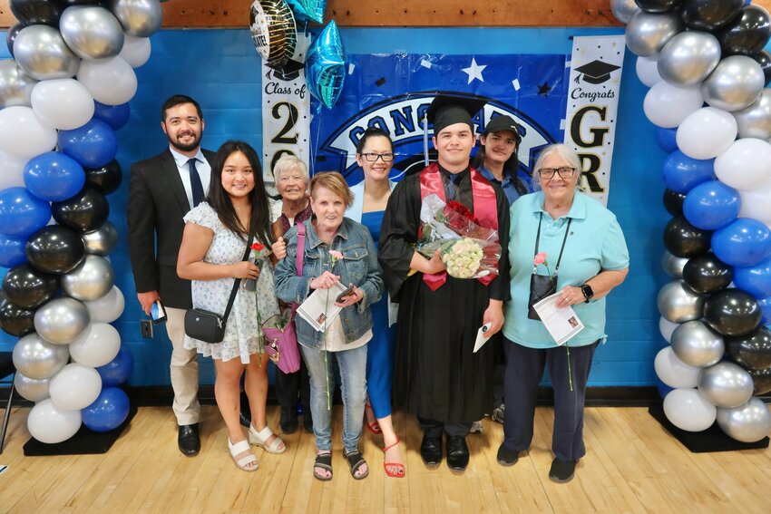 &ldquo;I have an amazing family supporting me,&rdquo; said HHH Job Corps graduate Nikoli Fitzgerald, pictured with several family members after the commencement ceremony held on May 22. He completed HBI&rsquo;s Building Construction Technology trade at the St. Paul, Minn. center before enrolling in advanced Overhead Line training at Oneonta Job Corps in New York. Fitzgerald now works full-time as a lineman for Miller Electrical in Hasting, Minn.