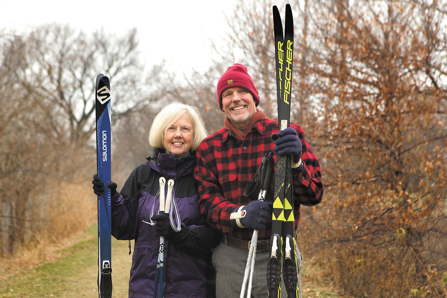 Linda Grieme (left) and Gregg Kelley (right) have been members of the NSSTC for decades. They’re drawn to others who love and value silent sports. They bought their home, in part, because of its proximity to the Hiawatha Golf Course – where they’ve already skied a few times this year. (Photo by Margie O’Loughlin)
