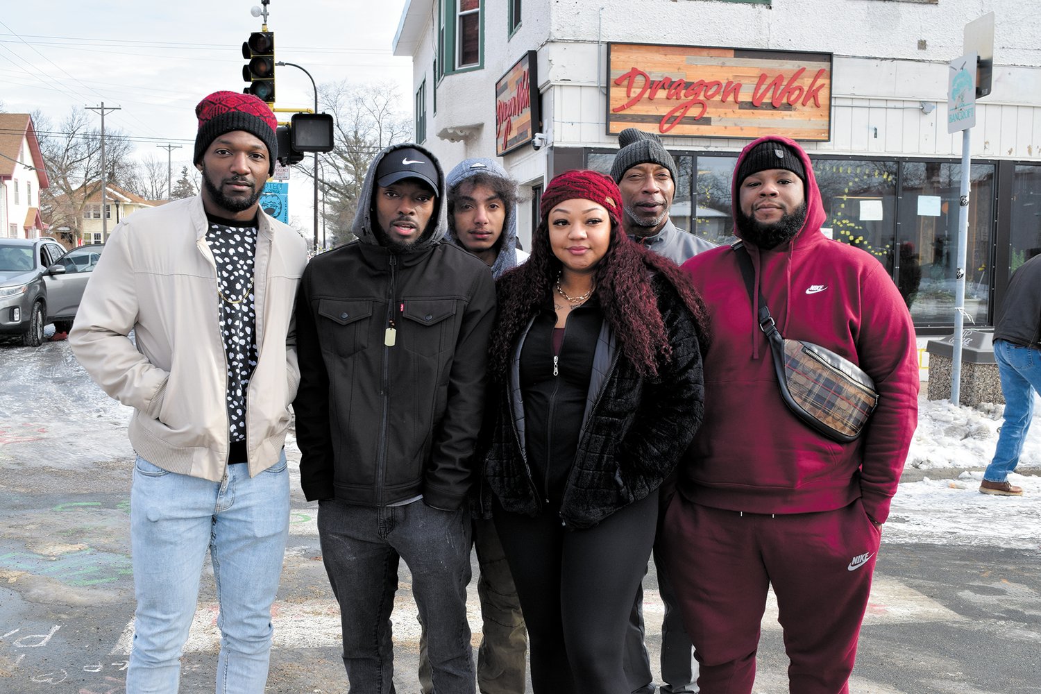Left to right: Javen Jackson, Felton Jackson, Zaire Jackson, Mecca Jackson, Felipe Jackson and Kyshon Malden were grateful that their visit from Pensacola to George Floyd Square coincided with the raising of the fist on MLK Day.