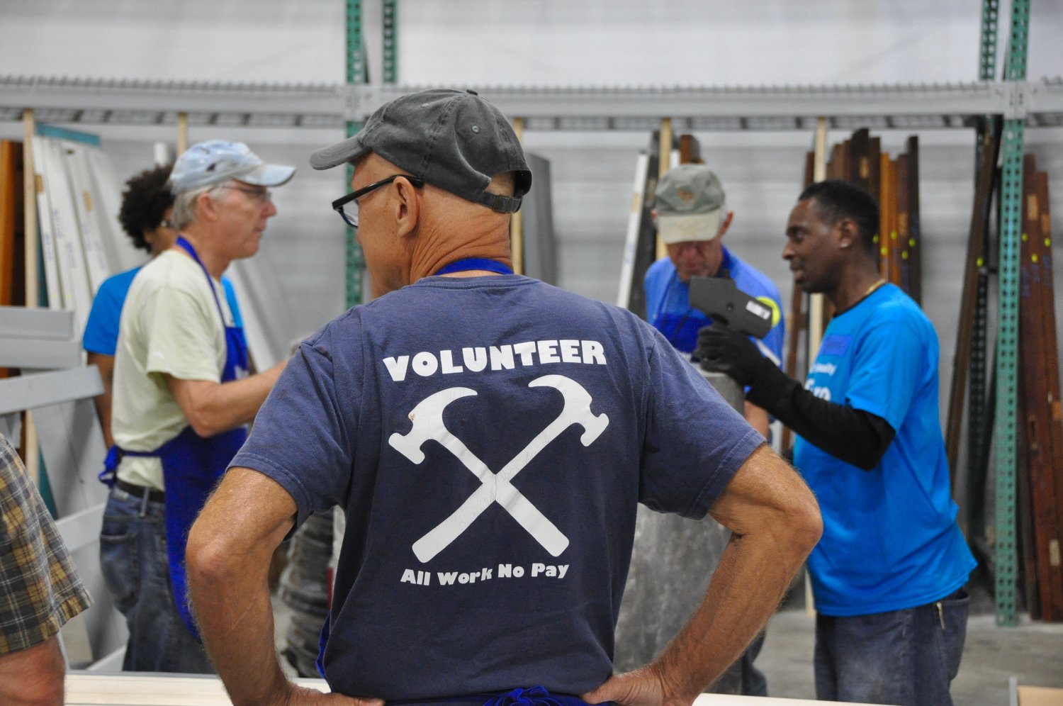 Volunteers assist staff at the ReStore locations. (Photo submitted)