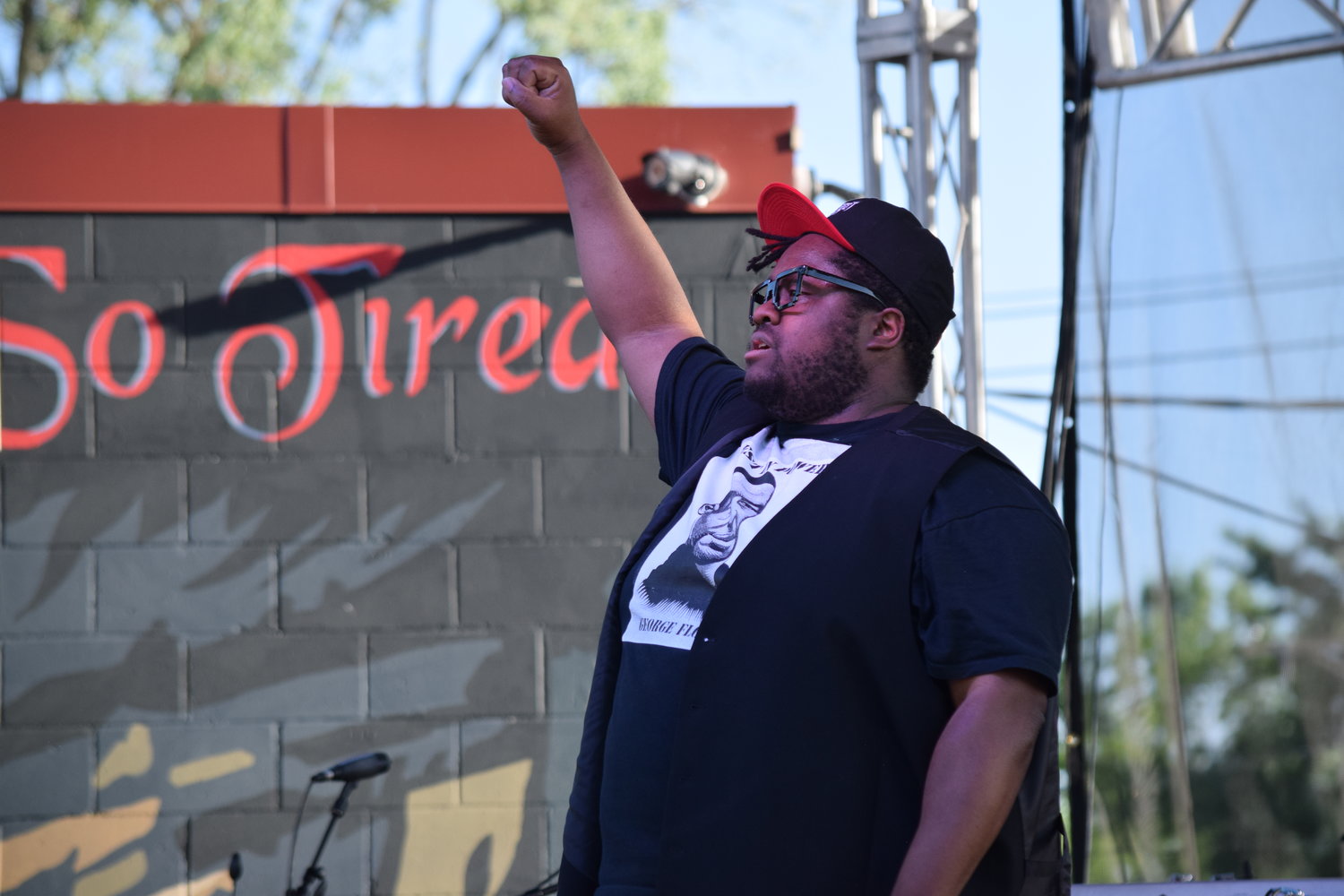 Minneapolis’ Nur-D sings “8:46” from his album “38th,” followed by “Swing Low, Sweet Chariot.” The day before the concert, Nur-D tweeted: 
“Tomorrow at the corner of 38th & Chicago Ave
We’re going to be turning mourning into dancing
We’re going to be celebrating 365 days of strength in the face of injustice
And how #Minnesota & #Minneapolis changed the WORLD forever in the wake of tragedy
I’ll see you there”