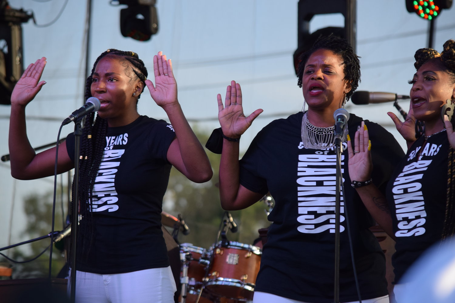 Three time Grammy Award Winning Sounds of Blackness, wearing t-shirts that say “50 years of Blackness” perform "Black Lives Matter: No Justice No Peace” and “Sick & Tired.” Their t-shirts read “50 Years of Blackness,” in celebration of their 50th anniversary this year. The chart-topping hit “Royalty” was introduced with a reminder to ignore those who try to paint George Floyd and others as “thugs,” because they’re royalty, kings and queens worthy of their crowns.
