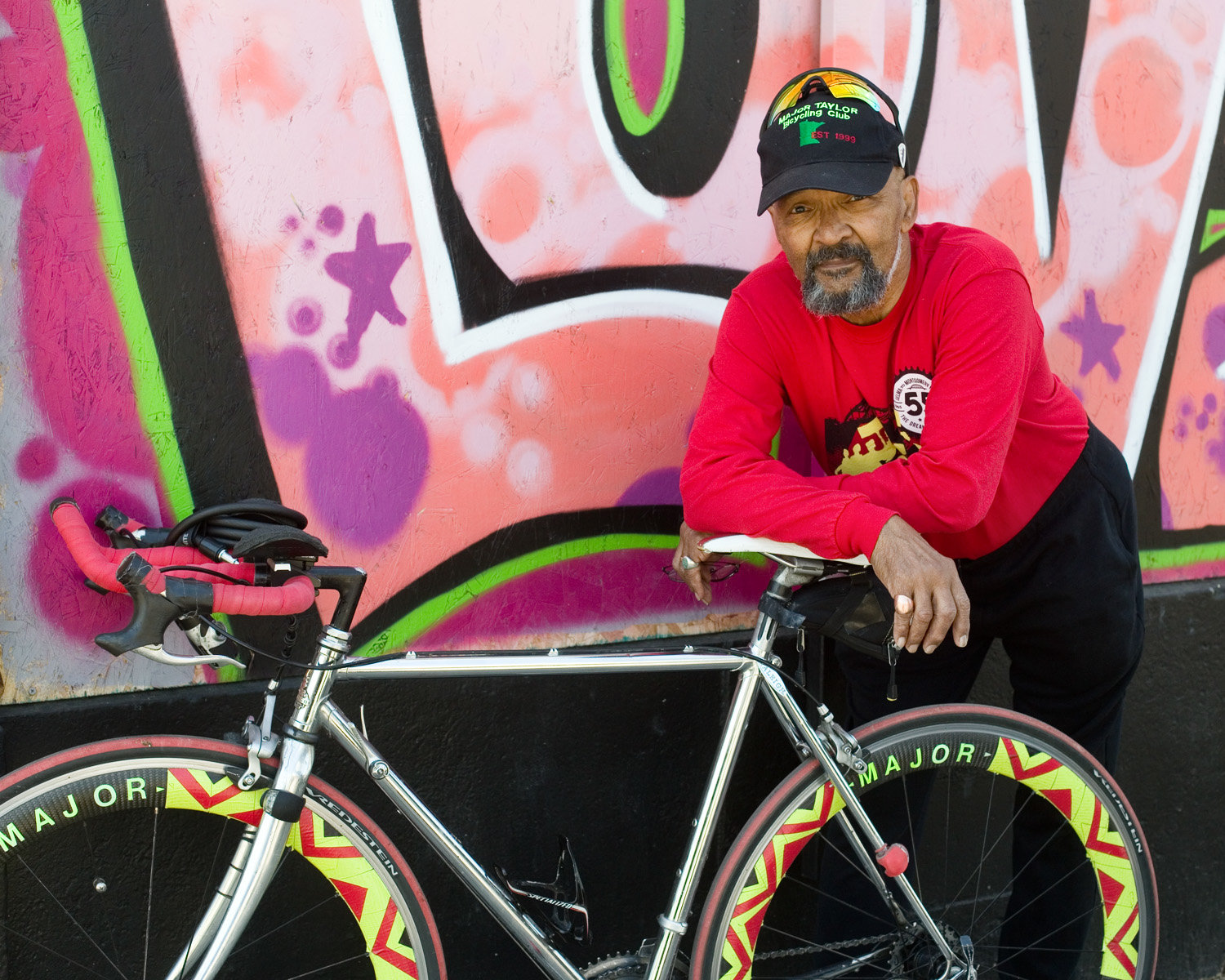 Louie Moore has been president of the Major Taylor Bicycling Club of Minnesota for 22 years. He is a tireless advocate for cycling: promoting the sport in communities of color, and improving biking conditions across the city for all. Club rides meet at his home near 48th Street and Columbus Avenue in South Minneapolis. Moore was the first Black person to buy a home on his block, and has lived there for 57 years. (Photo by Margie O’Loughlin)