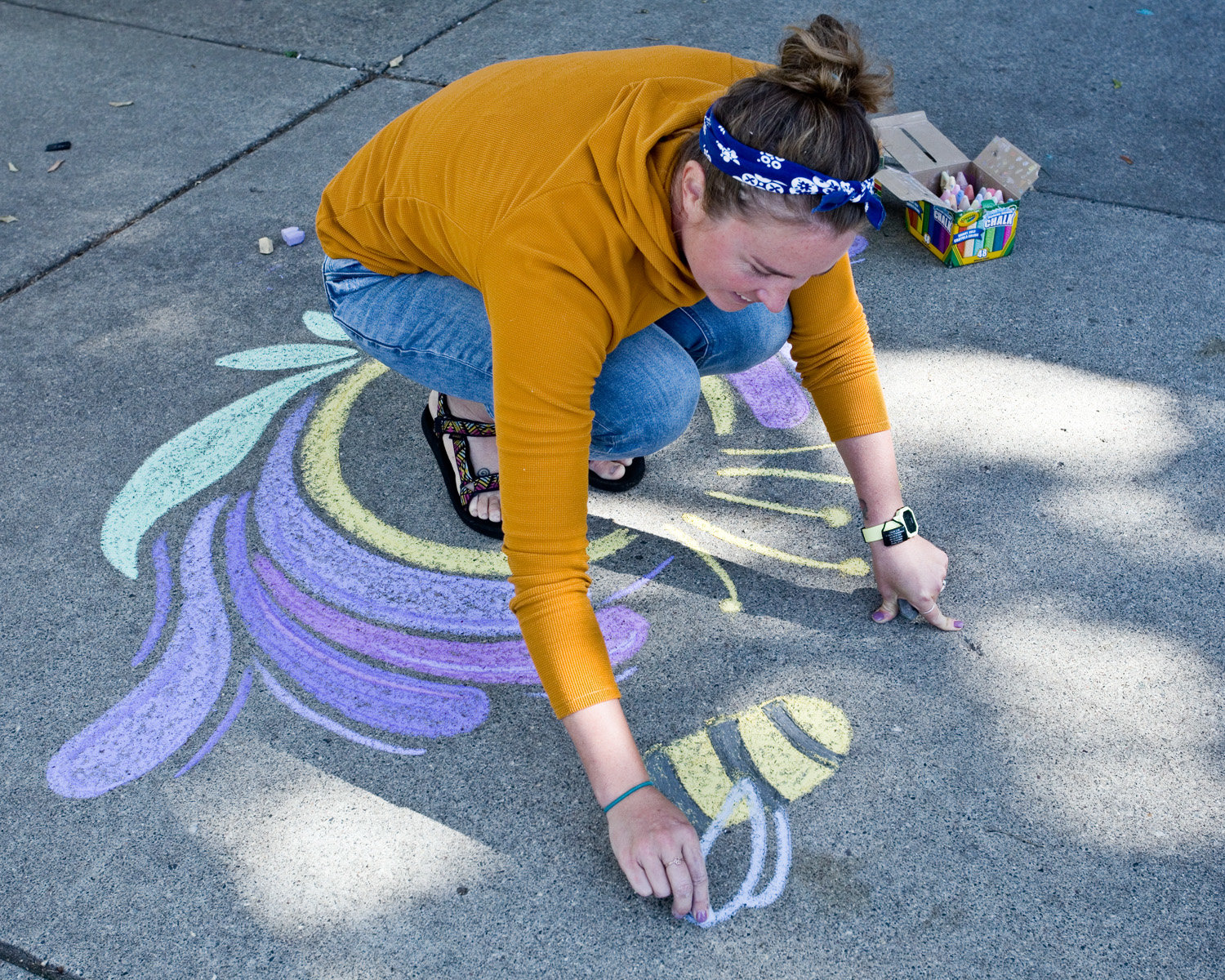 Taylor Tinkham is a chalk artist and illustrator living in Longfellow. Her chalk and mindfulness project, called CeMental Break, has been featured nationally in print media and online. Her illustrations encourage living mindfully in the present moment. View her work at www.taylortinkham.com. (Photo by Margie O’Loughlin)