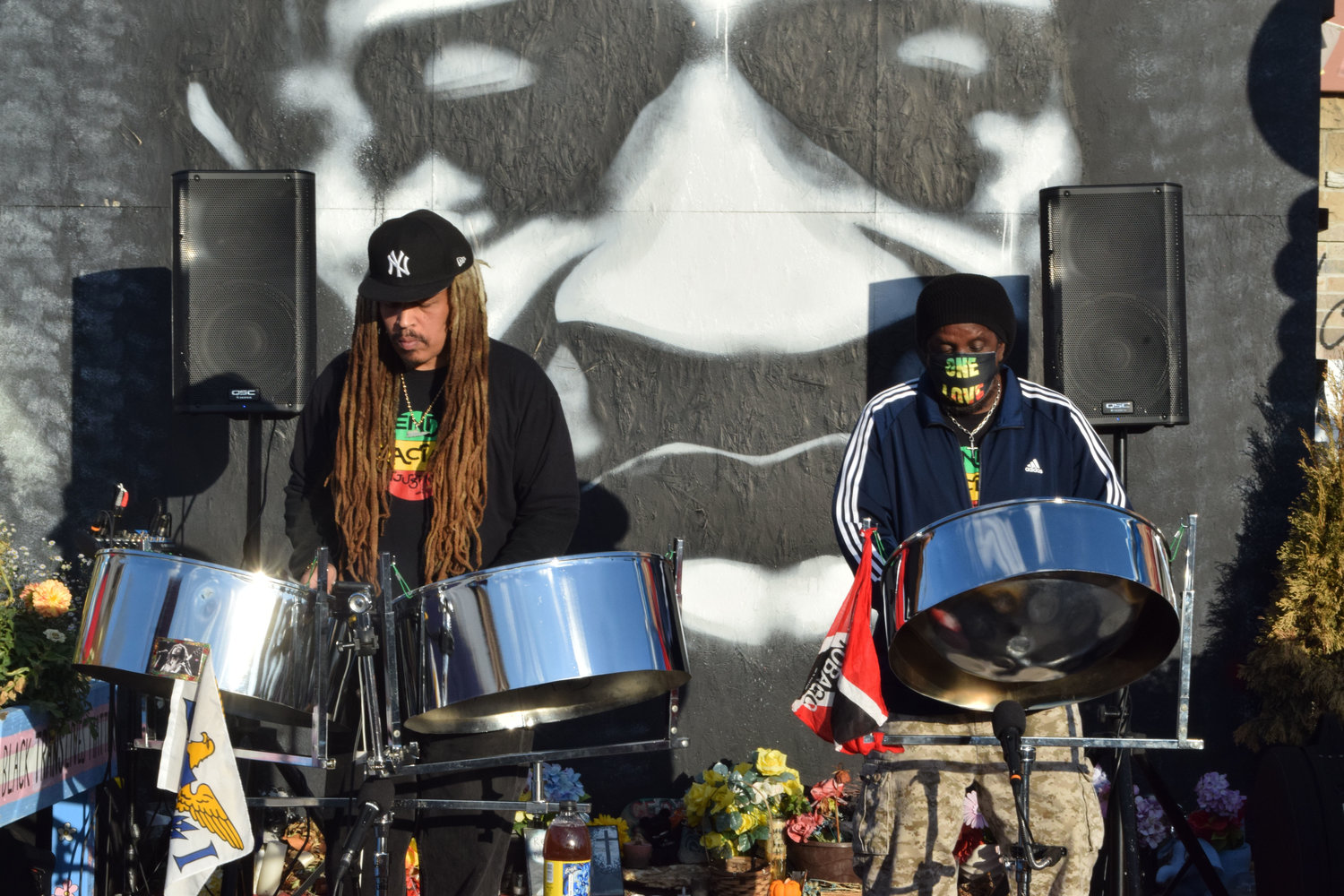 Pan Dimensions plays steel drum “sounds from the Caribbean” at the George Floyd memorial at a celebration of his life on what would have been George Floyd’s 48th birthday.