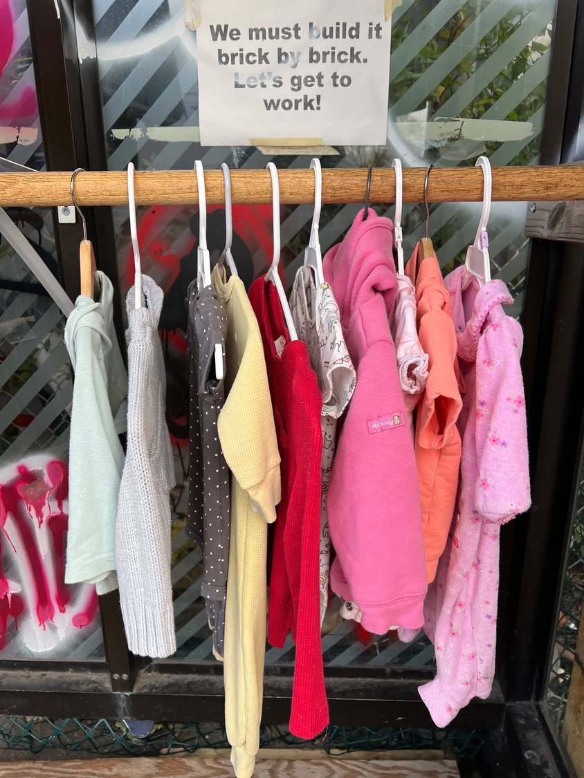 Clothing and shoes are available for all ages at The People’s Closet on 38th St., just west of Chicago Ave. (Photo by Jill Boogren)