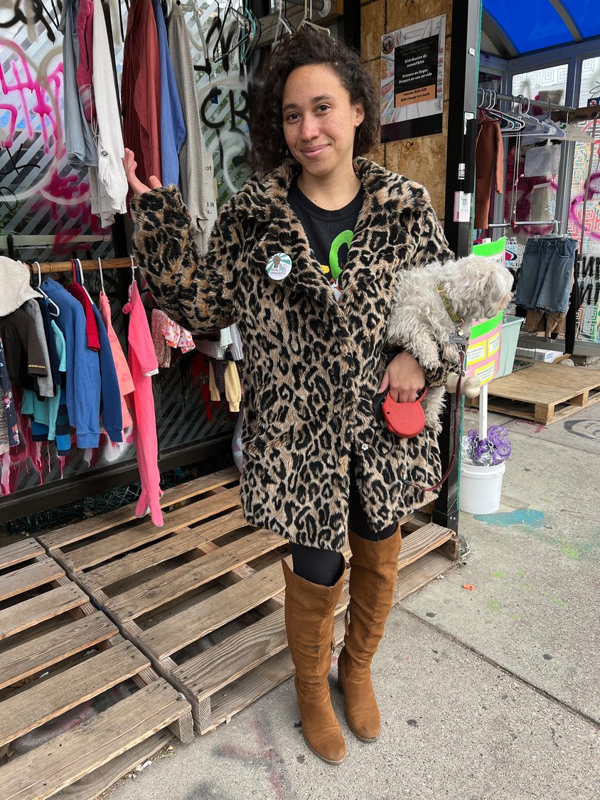 Jennie Leenay, GFS community member and caretaker of The People’s Closet, with their pup Joyoncé. It's important to Leenay that fashion reaches everyday people, and that people feel connected to themselves and their community. (Photo by Jill Boogren)