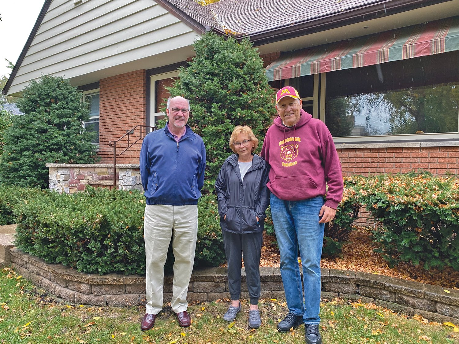 Bob Albrecht (left) stands with Janet and Lee Nelson. Albrecht currently lives and works from home in the house Janet's dad built along Shoreview Ave. Lester Strom was a self-employed home-builder whose firm, Strom & Mayville, constructed many single-family homes, apartments and duplexes in the Nokomis East neighborhood.