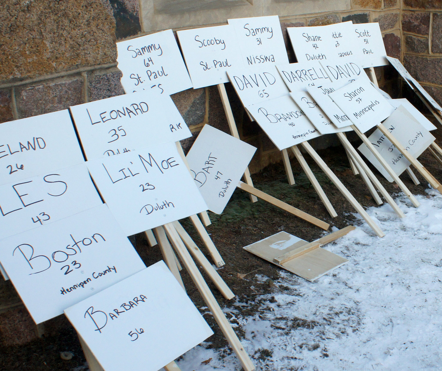 A memorial march for the homeless who have died took place Thursday, Dec. 16, 2021 at 4 p.m. Braving the cold, about 200 marchers bearing signs with the ages and names of the deceased started from Plymouth Congregational Church (19th and Nicollet Ave.) and looped north, returning to the church