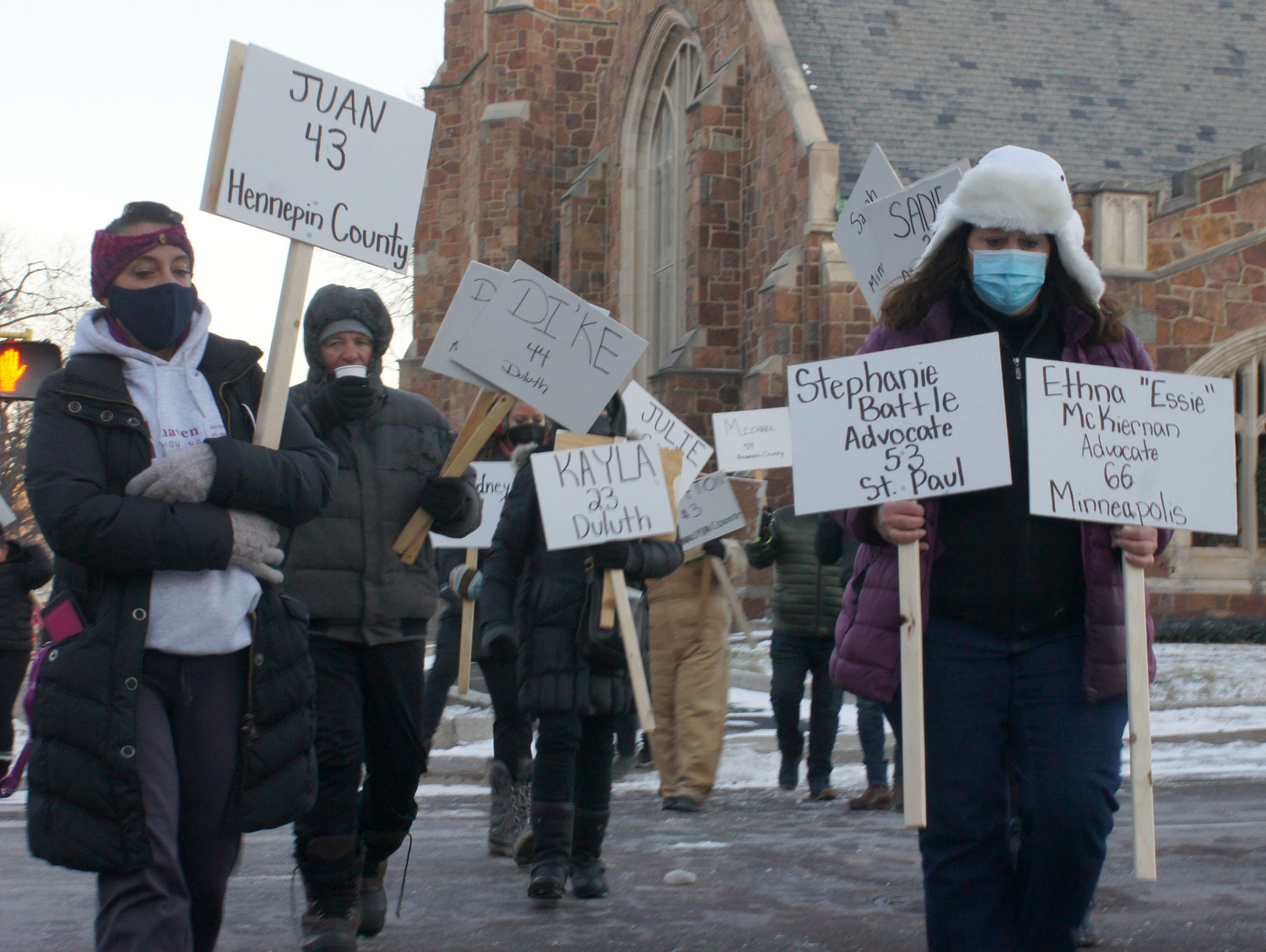 A memorial march for the homeless who have died took place Thursday, Dec. 16, 2021 at 4 p.m. Braving the cold, about 200 marchers bearing signs with the ages and names of the deceased started from Plymouth Congregational Church (19th and Nicollet Ave.) and looped north, returning to the church