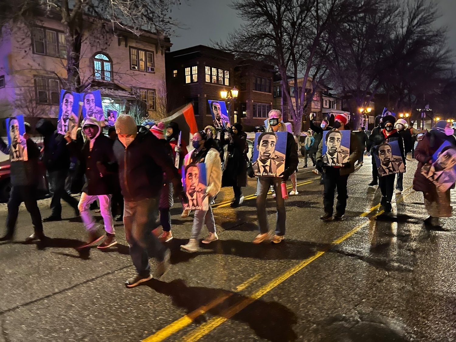 Demonstrators march from Summit Avenue to Grand Avenue, around the Governor’s Mansion and back.