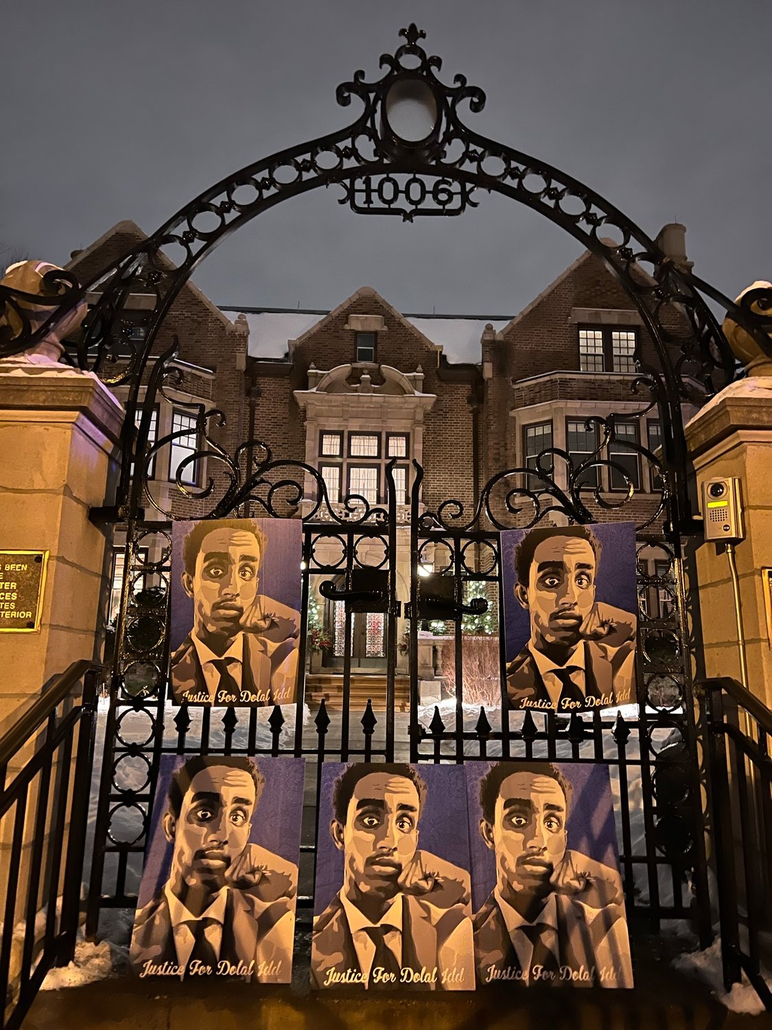 Posters of Dolal Idd are left at the gates of the Governor’s Mansion