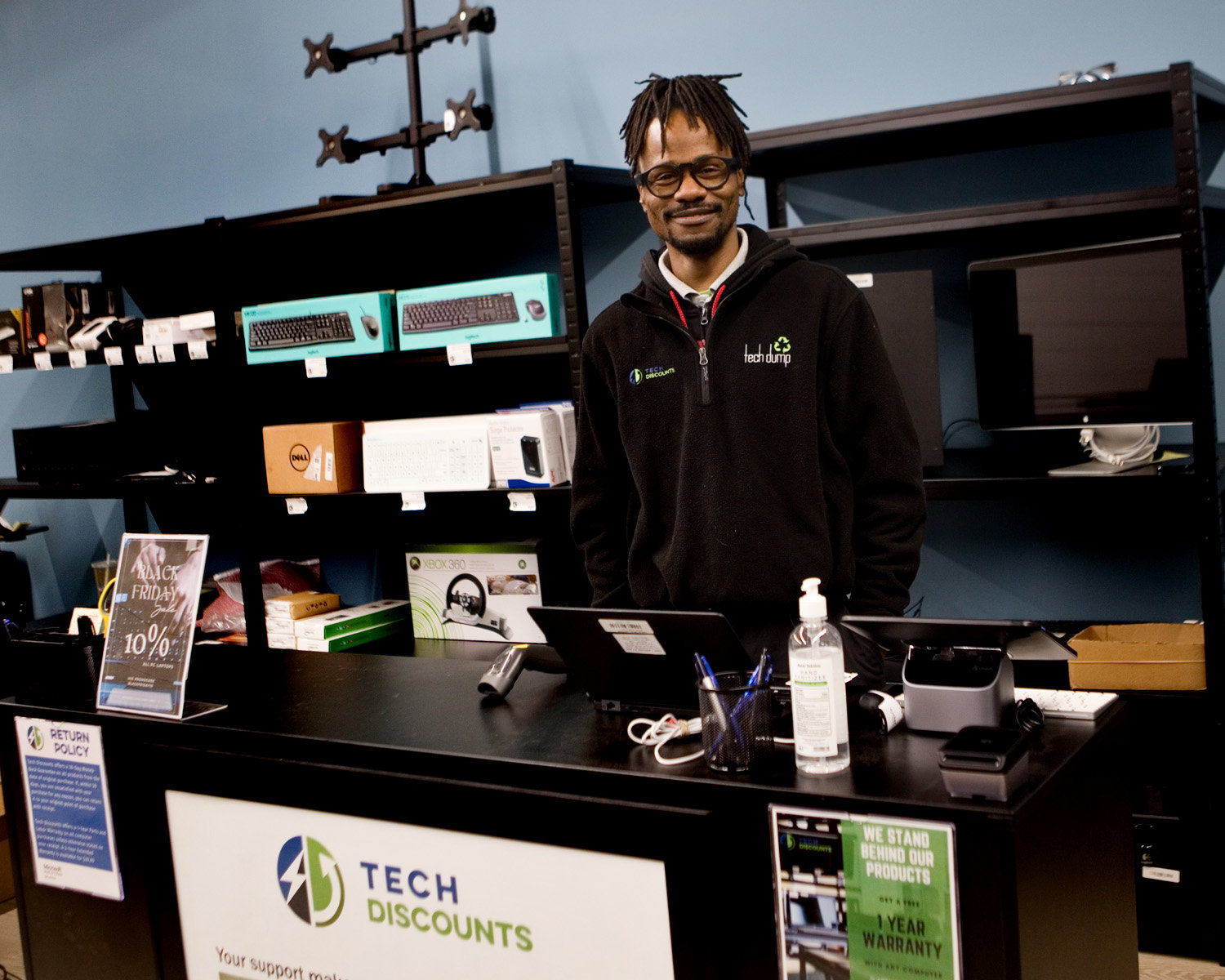 Both retail stores carry three main brands of computers: Dell, Hewlett-Packard, and Lenovo. Large quantities of computers are sold to schools and non-profits, but community members are welcome to shop, too. Wil James is the store manager of the St. Paul store. (Photo by Margie O’Loughlin)
