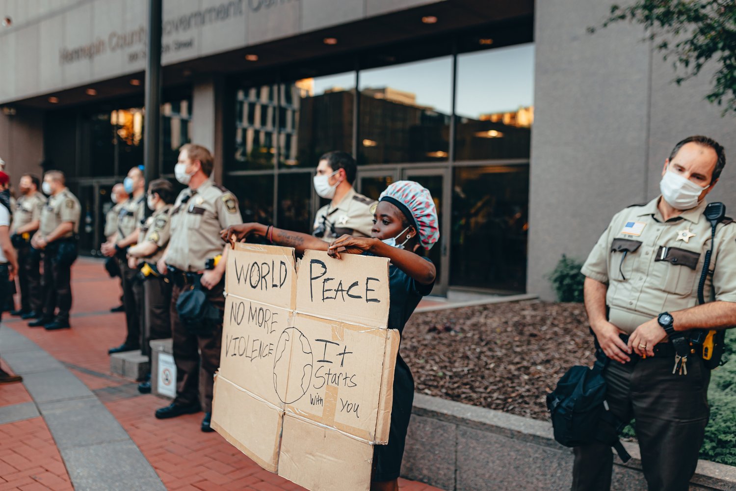 Peaceful protester at the Hennepin County Government Center in Minneapolis. (Josh Hild/Unsplash)