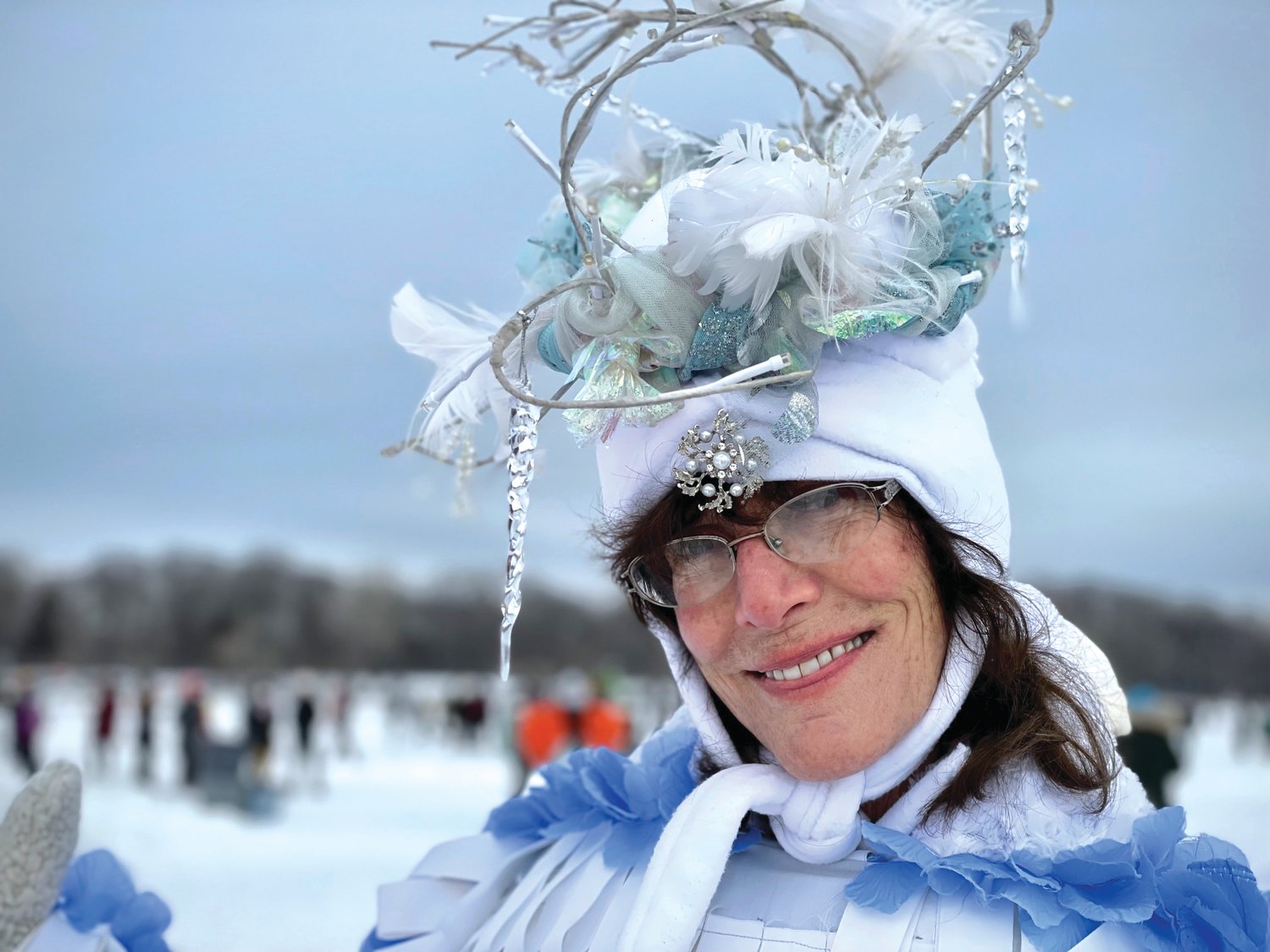 Artist Jill Waterhouse performs as the Goddess of the Glaciers during the Ice Shanty event on Sunday, Jan. 16, 2022. She wove her story with song, blessed seekers of wisdom with her ice wand, and granted wishes to the young at heart. (Photo by Susan Schaefer)