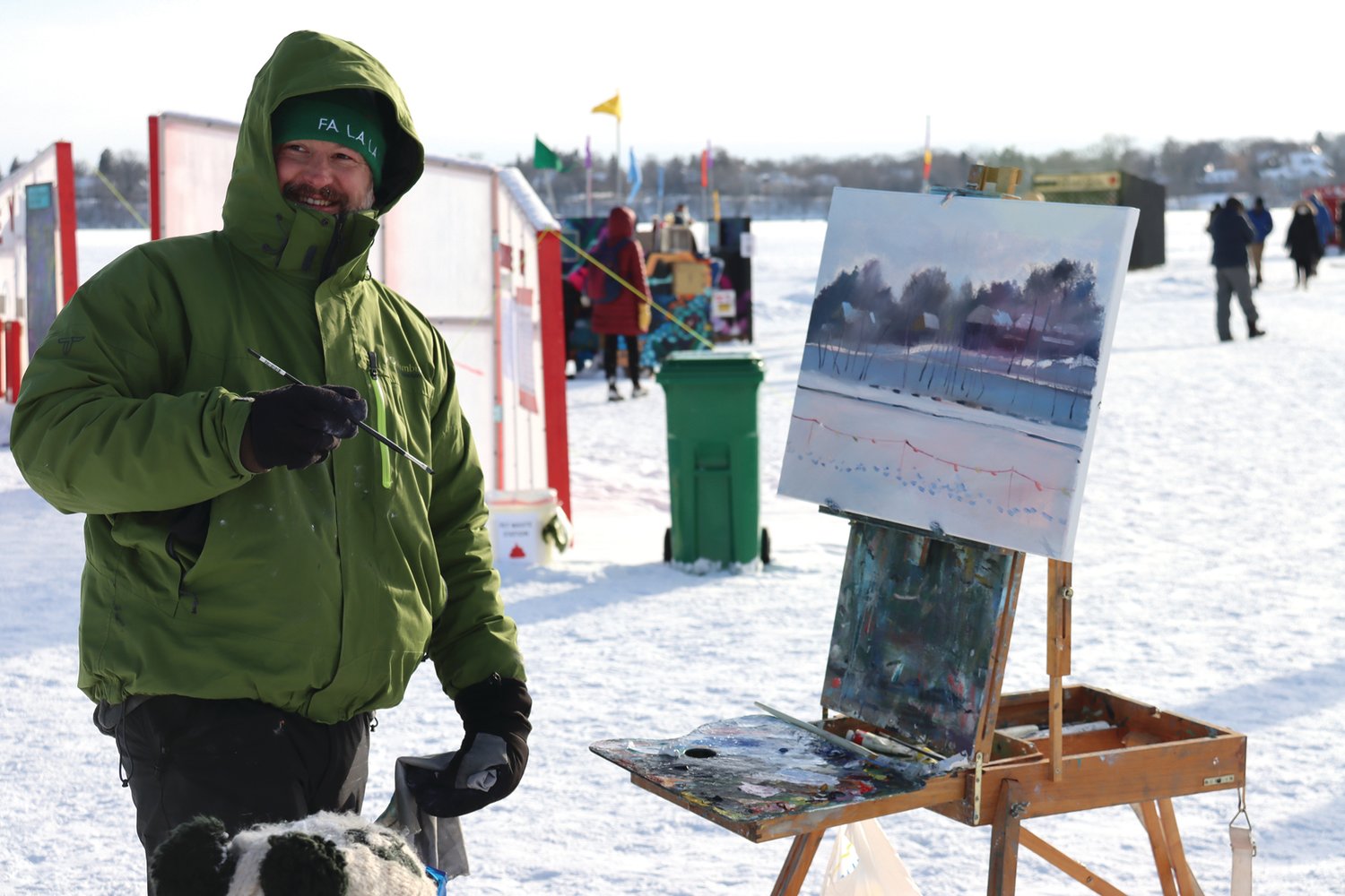 Tadas Kosciuska paints on-ice at Bde Unma /Lake Harriet for the first time on Sunday, Jan. 23, 2022. He’s a member of the Outdoor Painters of Minnesota, which arranges group paint-outs at scenic locations. (Photo by Tesha M. Christensen)