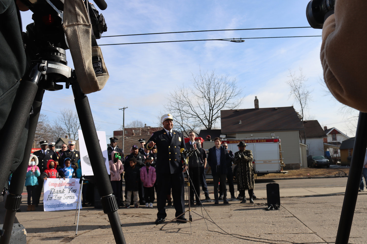 Minneapolis' second Black fire chief, Bryan Tyner, speaks at the renaming ceremony in Longfellow on March 17. "I'm just so happy to see this day finally here," said Tyner.  (Photo by Tesha M. Christensen)