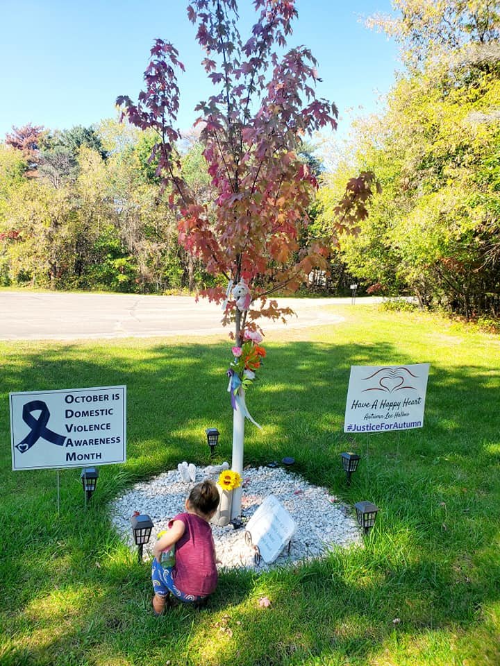 Delylah visits the Autumn Blaze maple planted to honor her sister. (Photo courtesy of Kelsey Kruse)