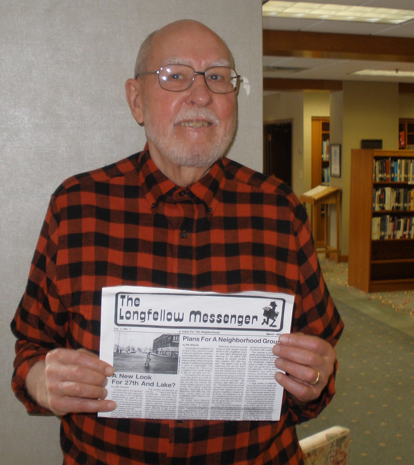Bill Milbrath holds a copy of the first Longfellow Messenger in 1983. He and his wife, Maureen, started the neighborhood newspaper. It was sold to deRuyter Nelson Publications in 1986, and to TMC Publications CO in 2019.