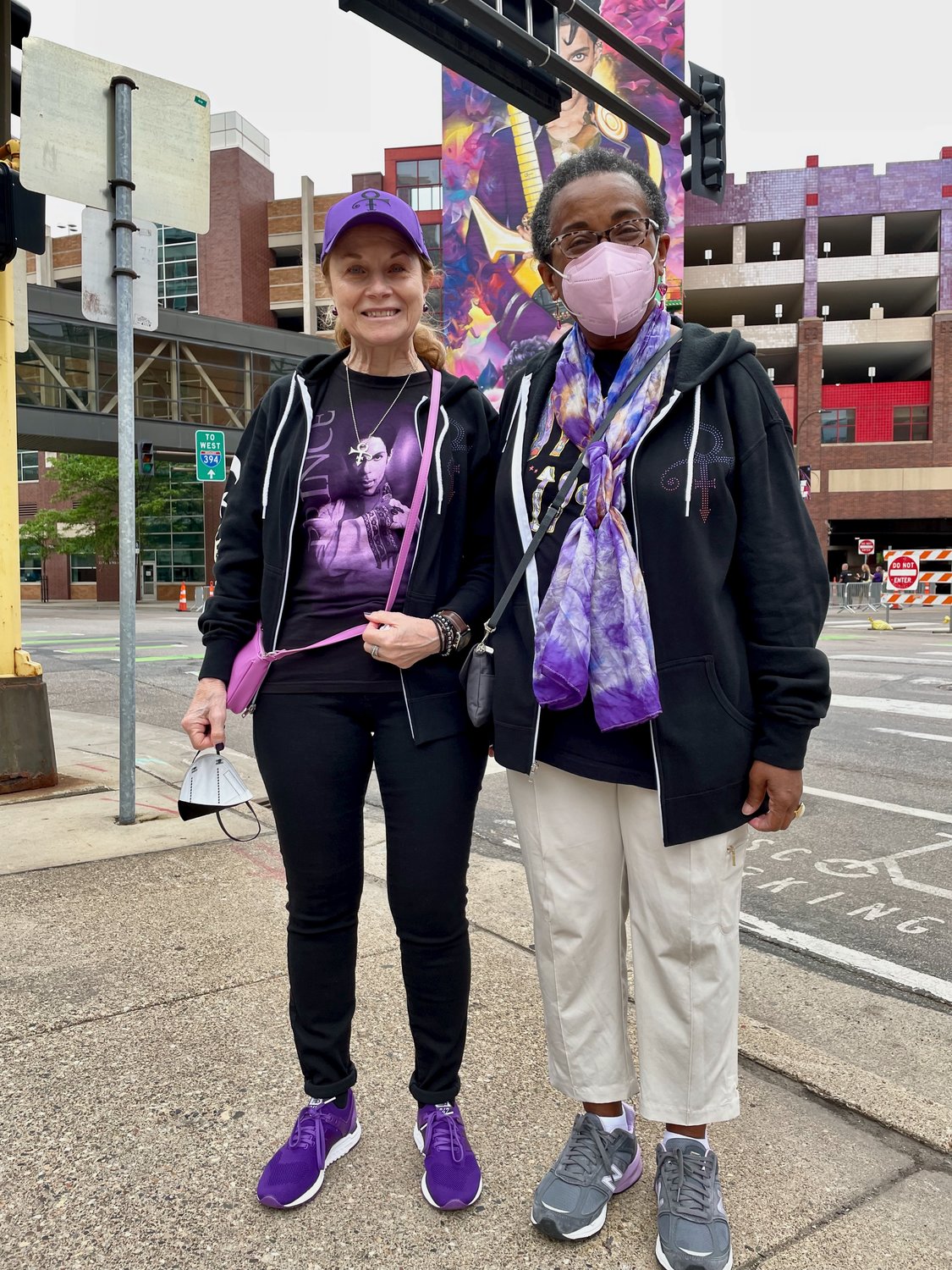 New Yorker visitors Dorothy Billis and Twila Perry view the new mural on their annual Prince pilgrimage. (Photo by Susan Schaefer)