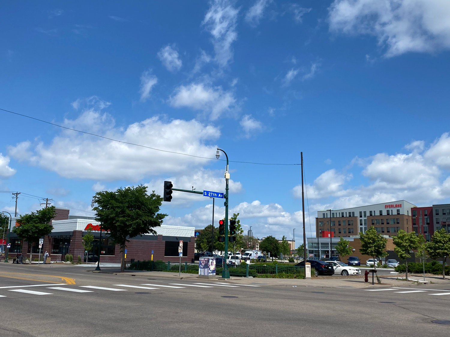 The view north from E. Lake and 27th of the newly rebuilt AutoZone, Wendy's and Everlake housing building. June 2022