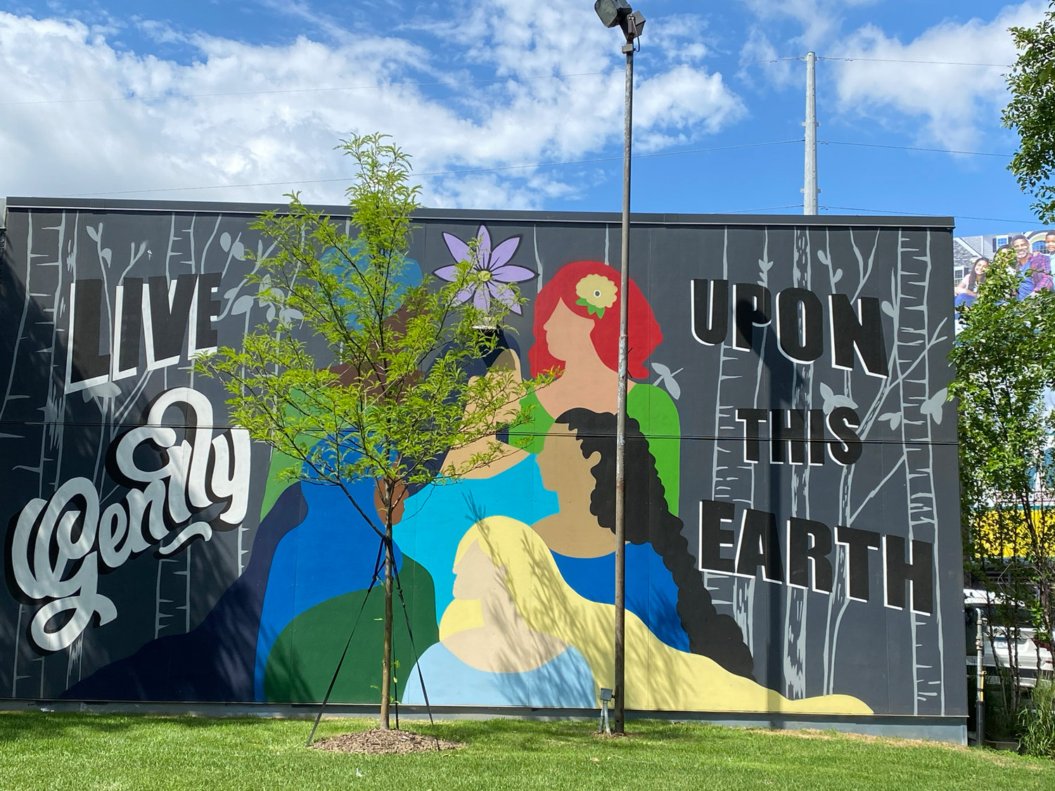A new mural on The Lift Garage, which was not destroyed along with many others on the block, including the Arby's that was next door.  (Photo by Tesha M. Christensen)