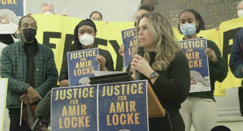 SWAE members organized alongside the group leading The Residents’ Complaint. This grassroots coalition, with consent from Amir Locke’s family, requested an ethics investigation into Mayor Frey for his failure to exercise proper judgement regarding no-knock warrant policies in Minneapolis, which led to Amir’s murder by the MPD. Above: Kristen Ingle (at podium) and Raycurt Johnson (with violin). (Photo submitted)
