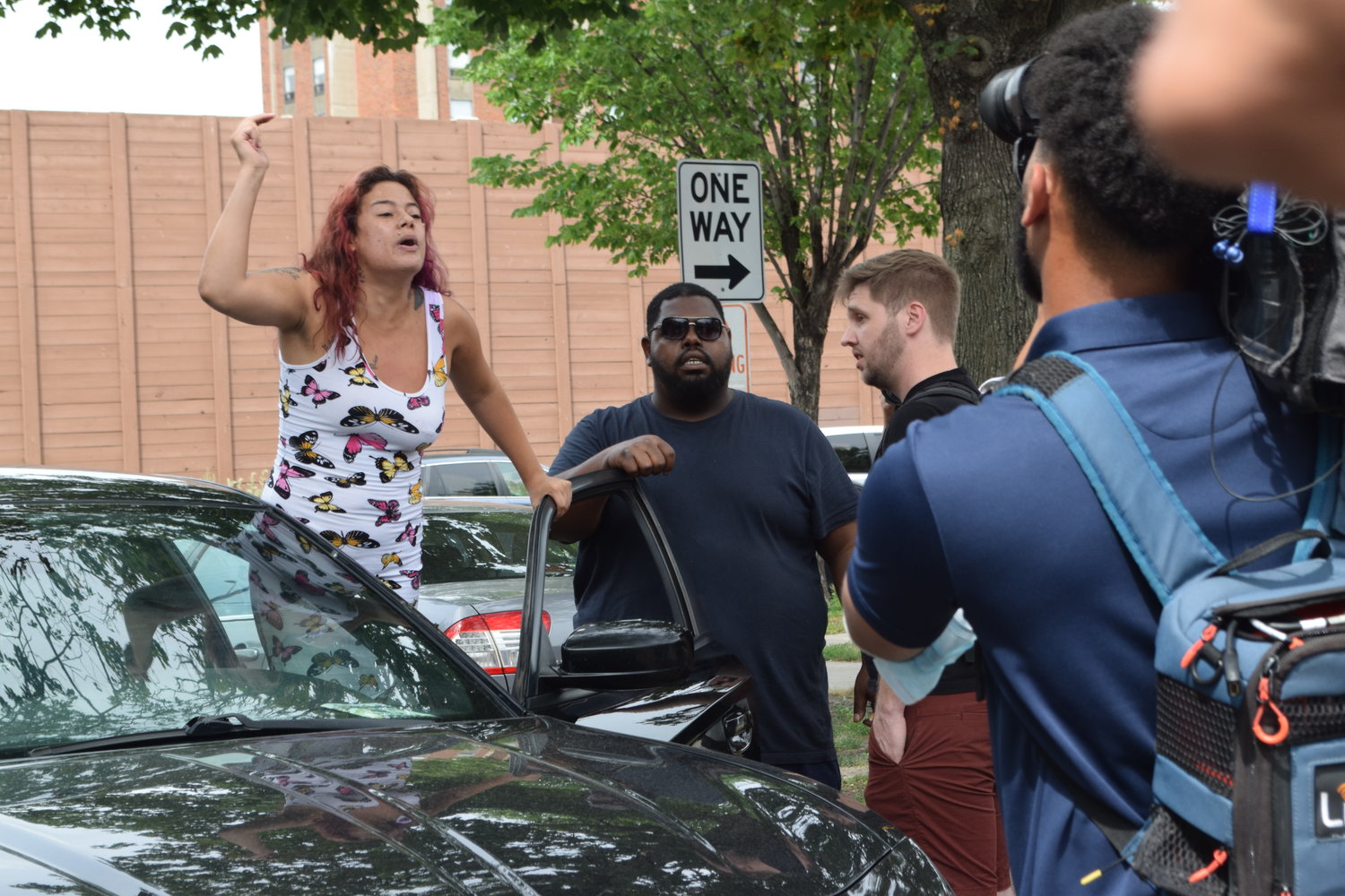 Arabella Foss-Yarbrough, who reported that bullets had been shot into her apartment, expresses her anger to the crowd. (Photo by Jill Boogren)
