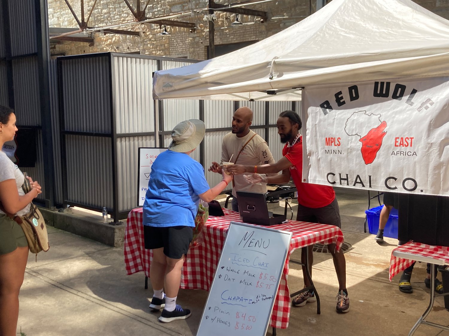 Red Wolf Chai sells its signature chai drink at Mill City Market on July 30.