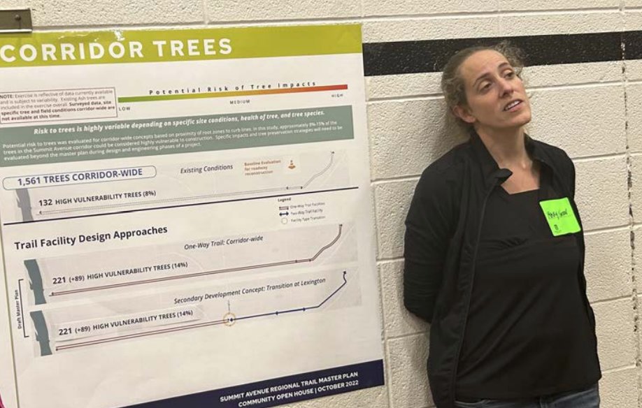 City Landscape Architect Mary Norton (at right) explains the city’s findings about tree loss that would happen when constructing the bike lanes. The city is working with the Forestry Department of St. Paul and will continue throughout the process.