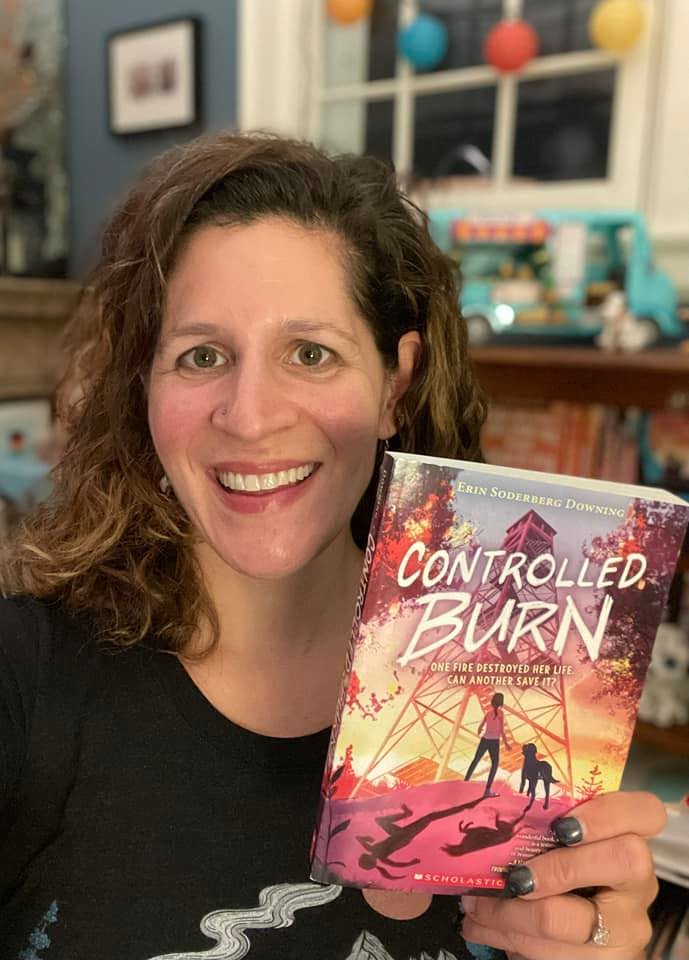 Tangletown resident Erin Soderberg with her latest book, “Controlled Burn.” Her mother worked for the forest service and actually fought wildland forest fires when Soderberg was a teenager.  (Photos courtesy of Facebook)