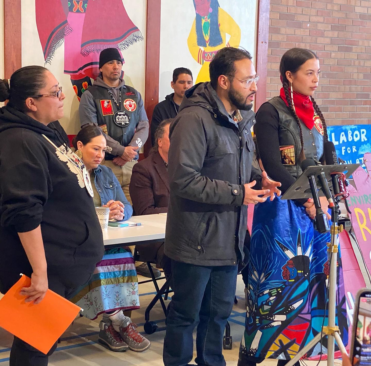 Cassandra Holmes (left), Joe Vital and Rachel Thunder speak at a press conference held on Wednesday, Feb. 22, 2023 at the Minnesota Indian Women’s Resource Center by Indigenous tribal members opposed to the demolition of the Roof Depot site for the city's public works site expansion. The 7.5-acre property is owned by the city, but the community's vision for the site includes an indoor urban farm. They were working to purchase the property in 2015 when the city threatened eminent domain and purchased it at a higher cost. (Photo by Tesha M. Christensen)