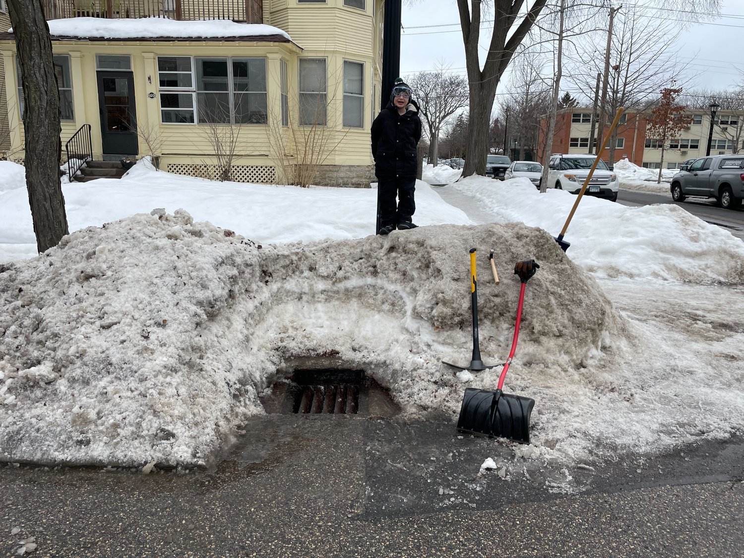 Cal Ortiz with Harold Green, the storm drain at the southwest corner of 27th Street and Dupont Ave. South. (Eric Ortiz)