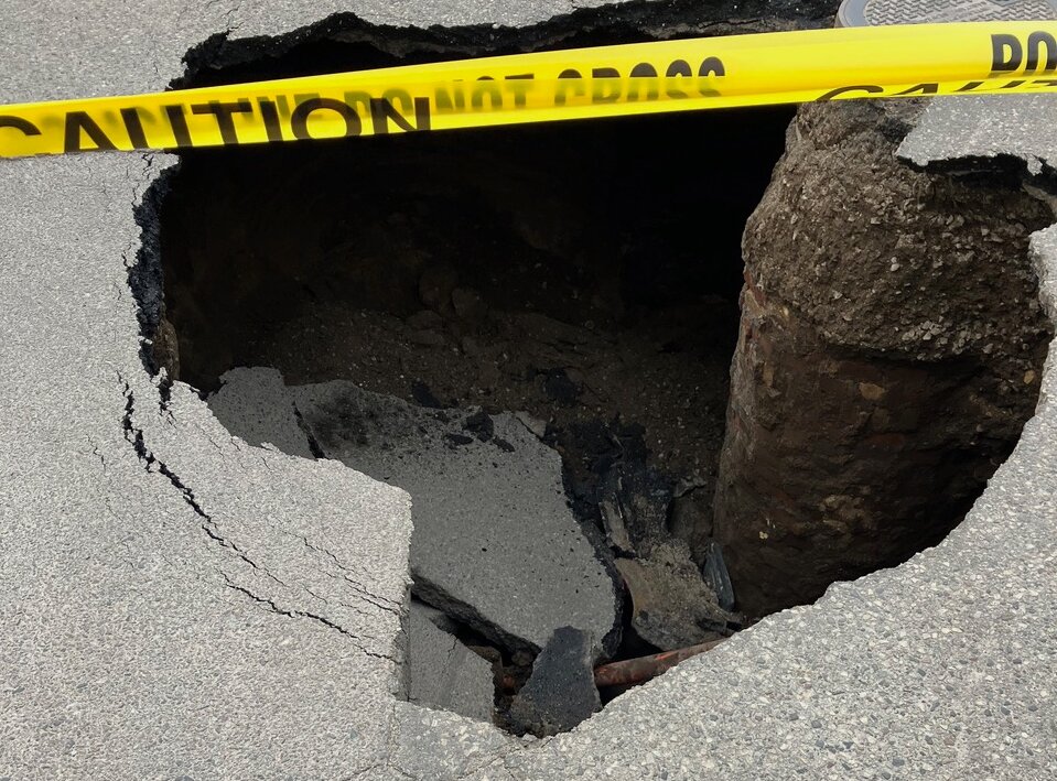A sinkhole opened up at 27th Street and Girard Avenue in Uptown Minneapolis on Easter Sunday.