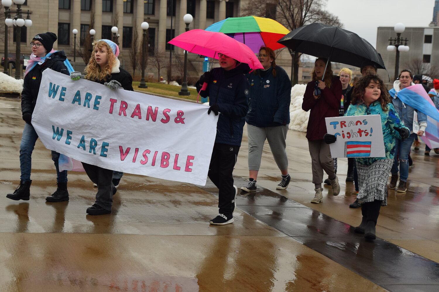 Youth march for trans rights outside the Capitol on March 31.